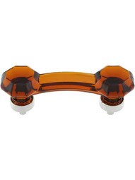 Amber Octagonal Glass Bridge Handle with Brass Base 3-Inch Center-to-center in Polished Nickel.